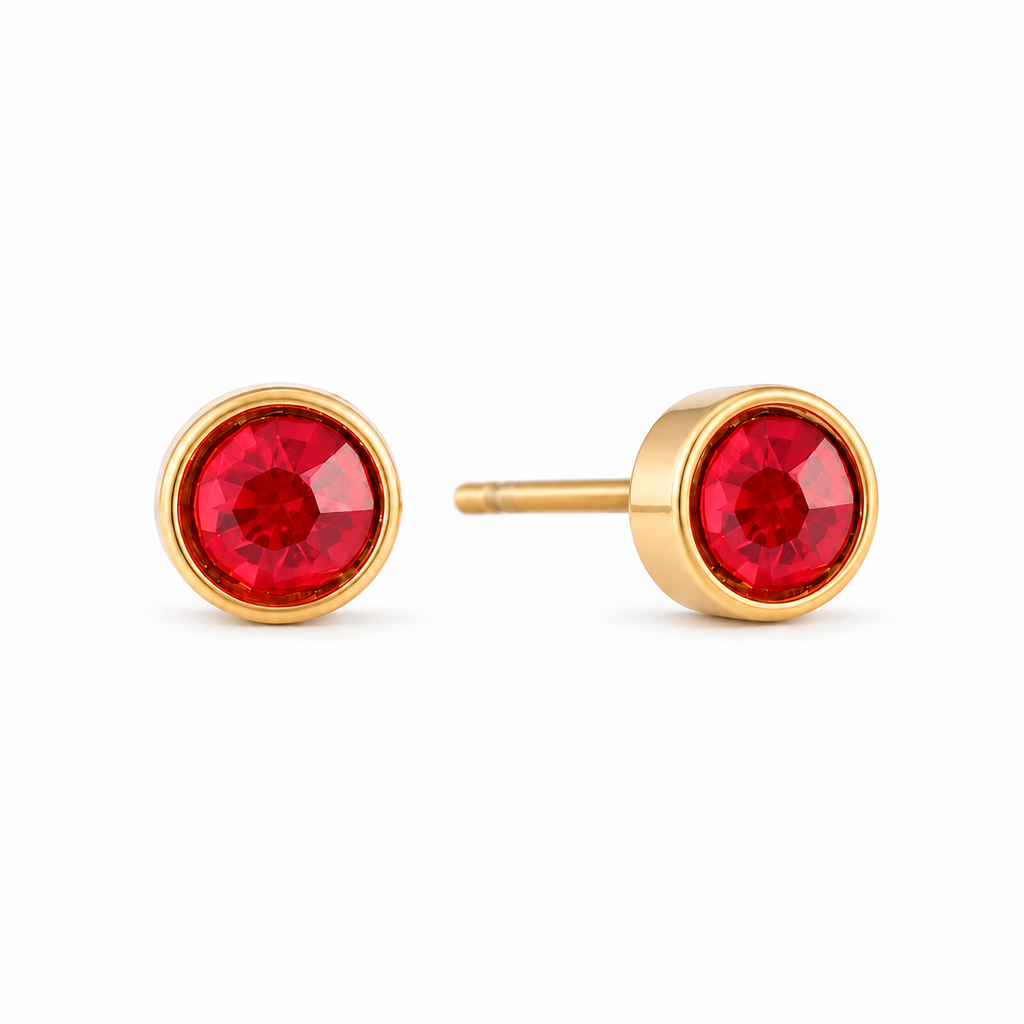 Pair of 4 mm red zirconia stud earrings in smooth gold-tone bezel settings