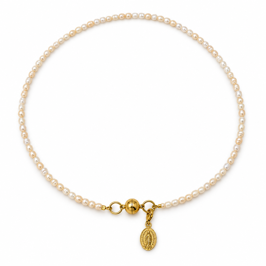 Rosario Rice Pearl Necklace with natural white pearls, a gold-tone magnetic clasp and a Virgin of Guadalupe charm