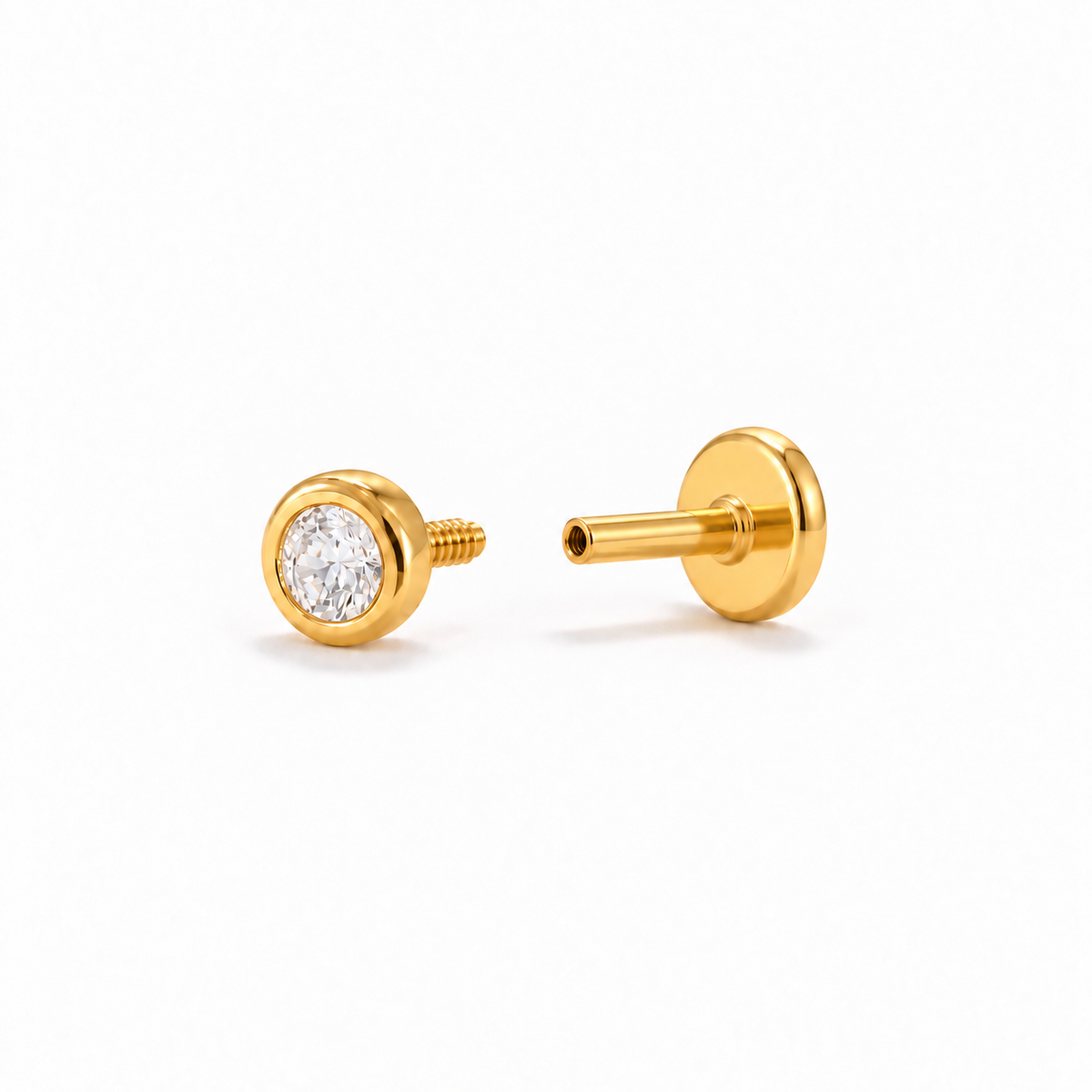 Solis Piercing stud in 925 sterling silver with 18k gold plating and a clear zirconia stone