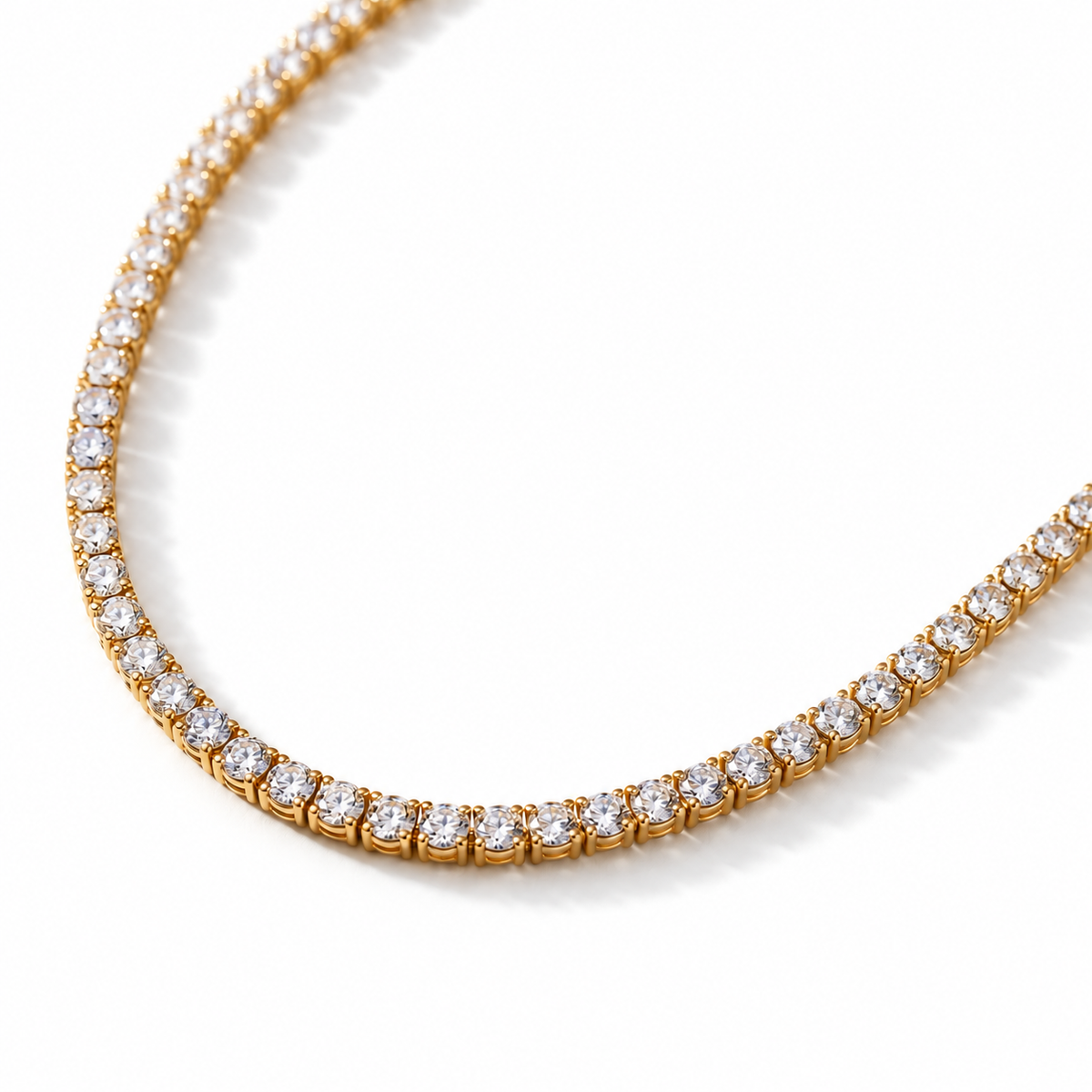Tennis Zirconia Necklace with a continuous row of clear 2.5 mm zirconia and a gold-tone 316L stainless steel chain