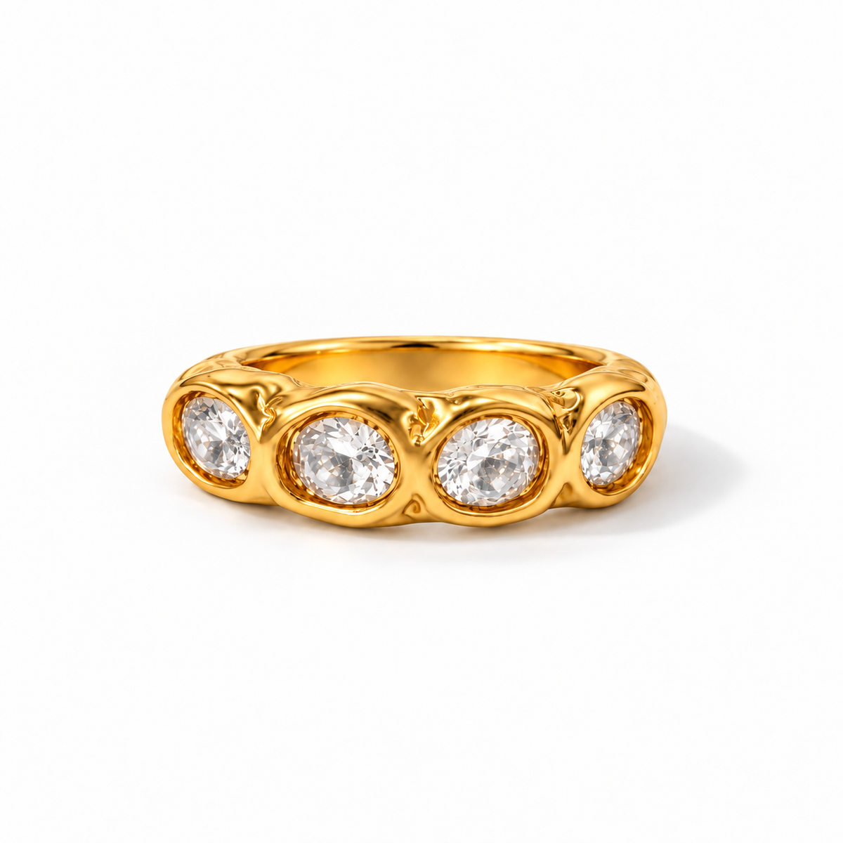 Textured gold-tone ring with two clear zirconia in organic bezel settings