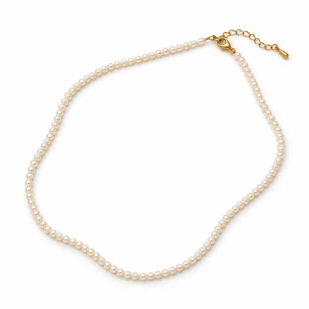 Gold-tone 316L stainless steel clasp and extender on the Tula Pearl Necklace